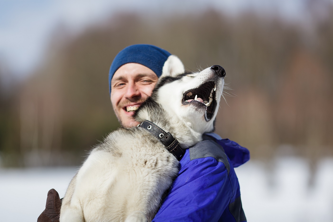 Happy Man with Hustky Dog